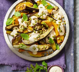After salad for colder weather? Try out this roasted pumpkin and eggplant with spiced yoghurt