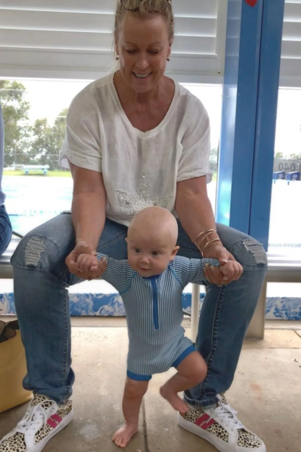 lisa curry gives grandson taj swimming lessons