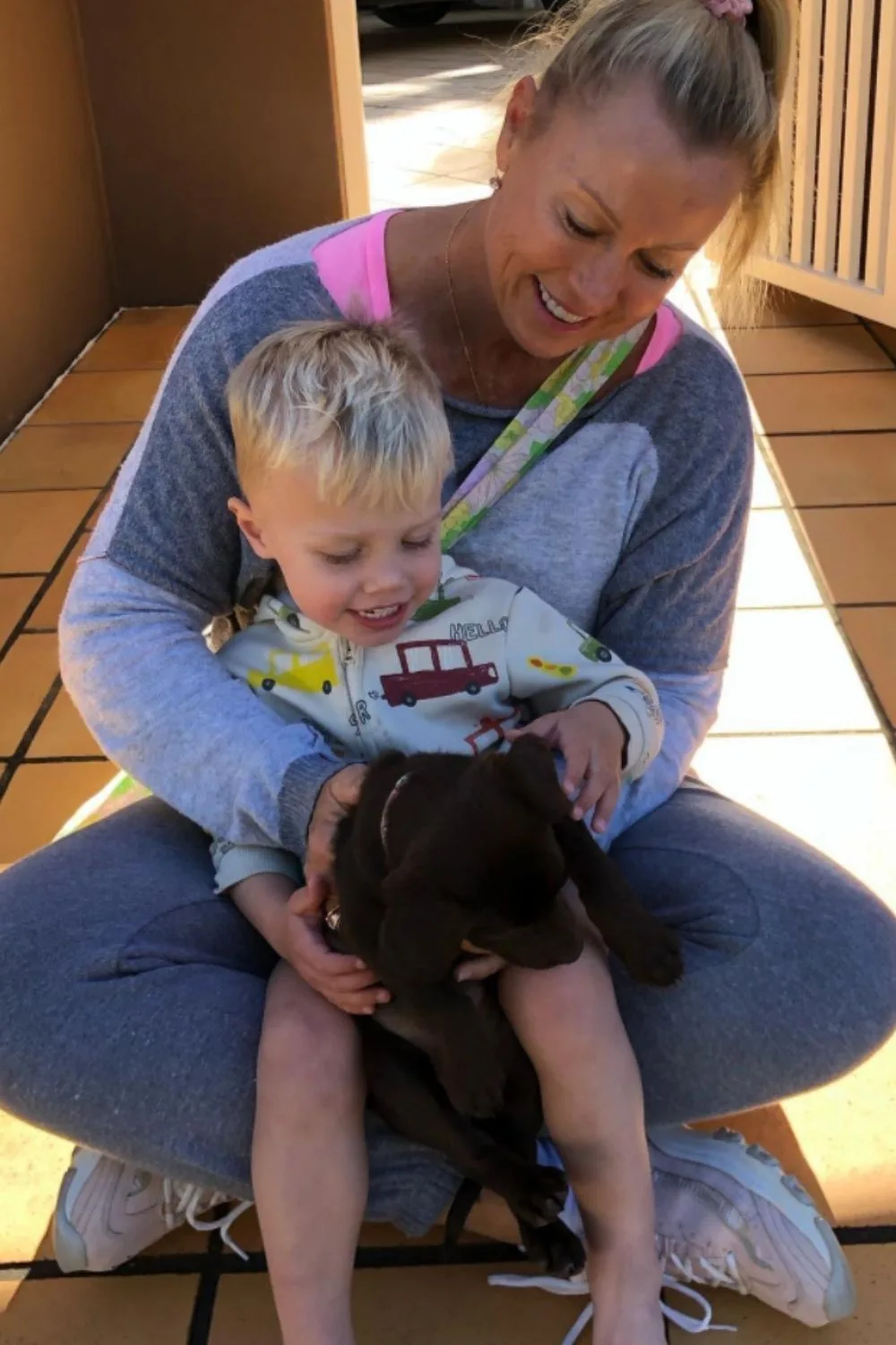 lisa curry puppy mali and grandson flynn