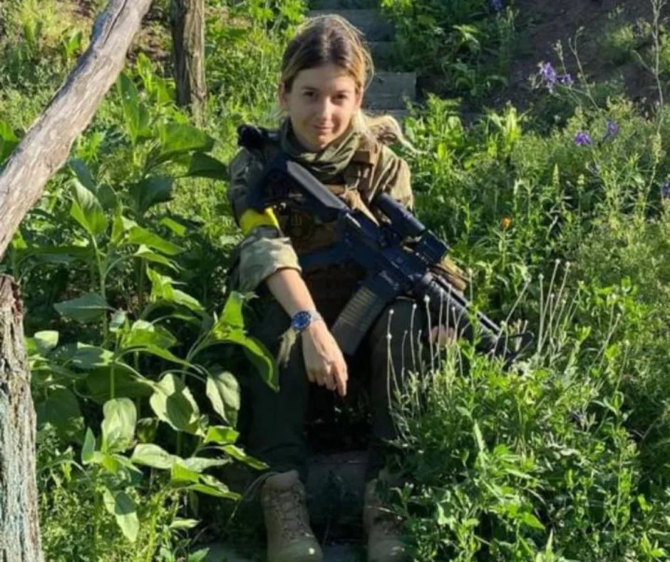 Emese with a rifle