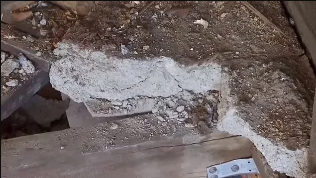 Tom found asbestos under the fireplace