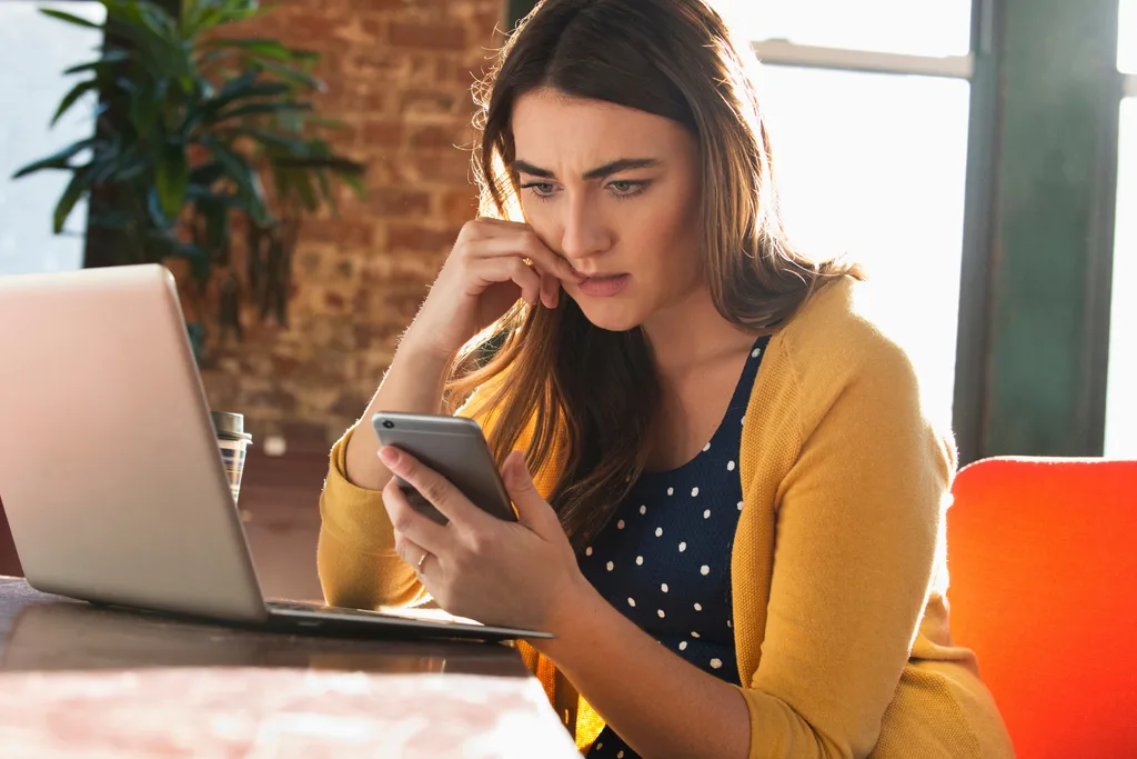 woman looking at phone