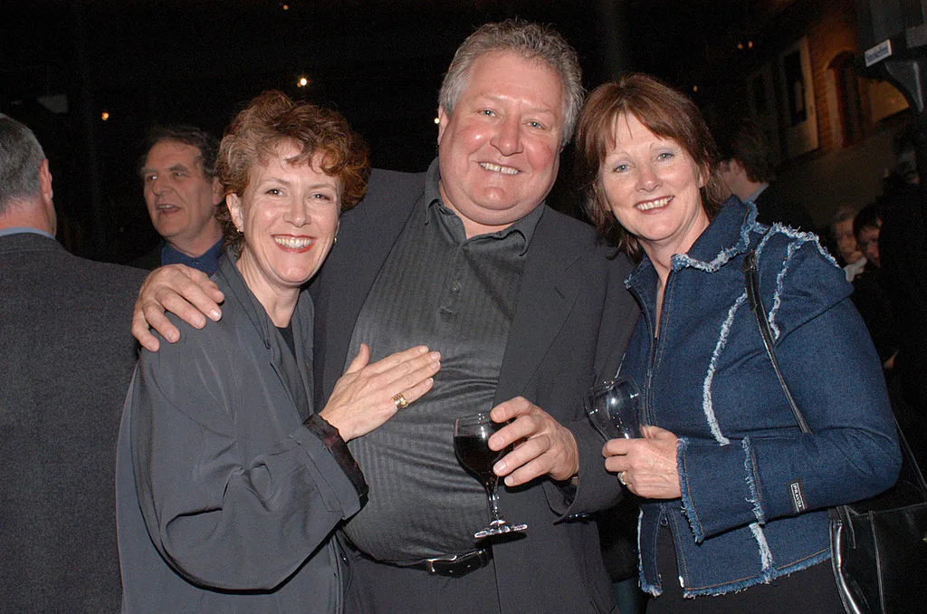 John - with wife Leslie (right) and onscreen Blue heelers wife Debra Lawrence (left).
