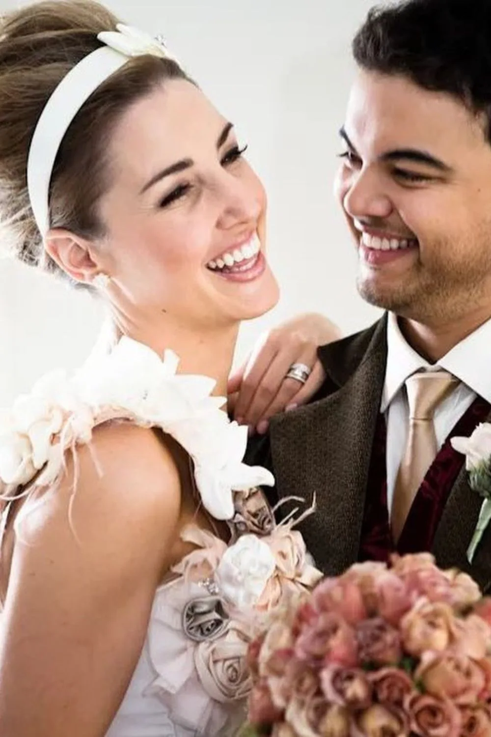 jules sebastian and guy sebastian laughing on their wedding day