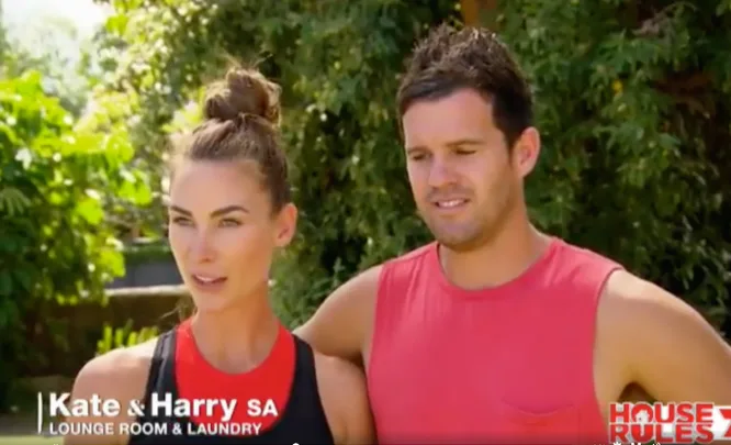 Kate and Harry from House Rules, outside, with trees in the background, discussing lounge room and laundry renovation.