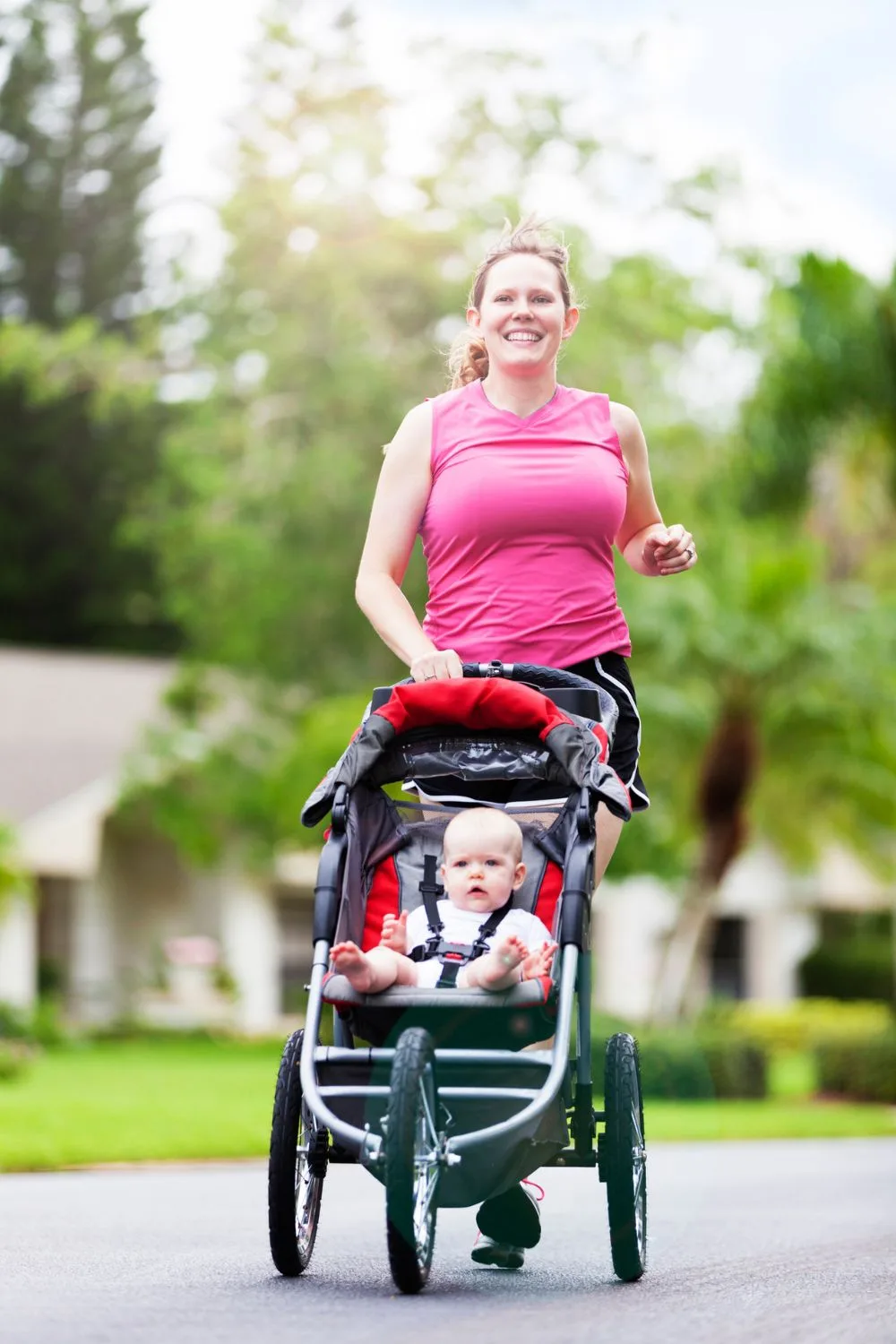 woman exercising with pram