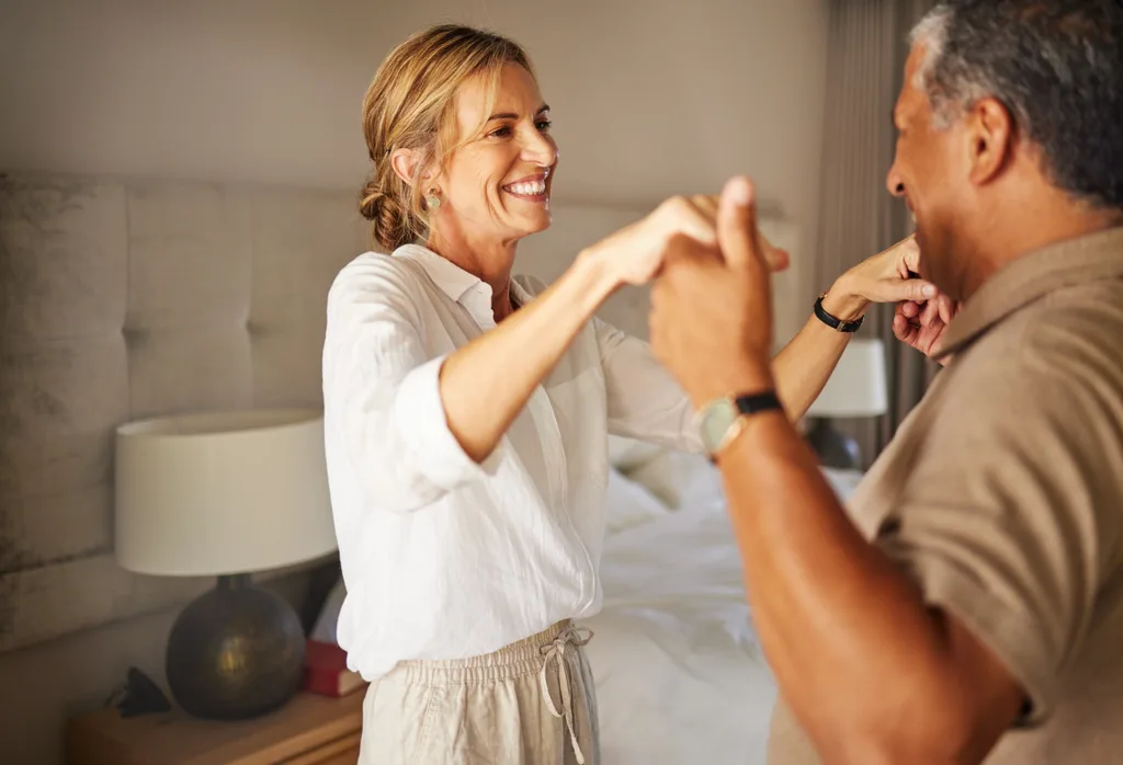 couple dancing in bedroom