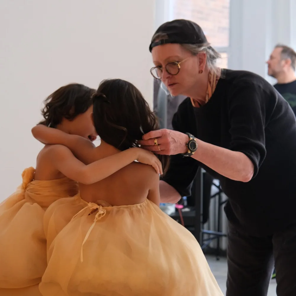 Anne Geddes photographing two little girls
