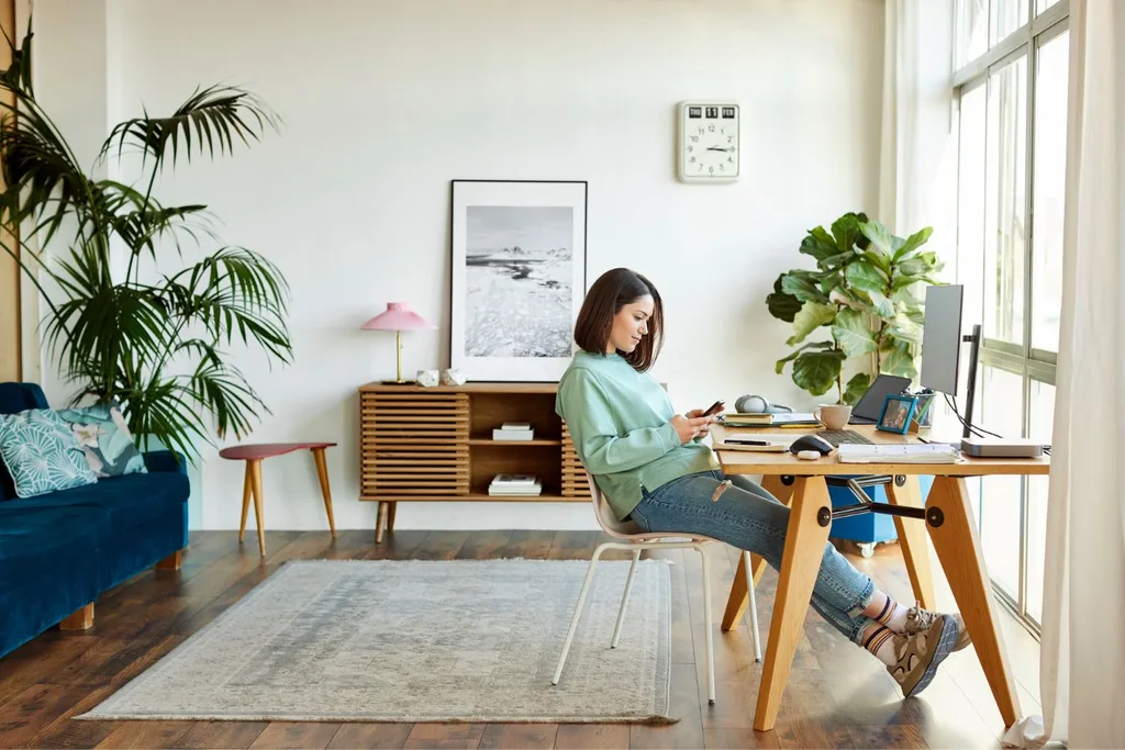 woman sitting in her home office