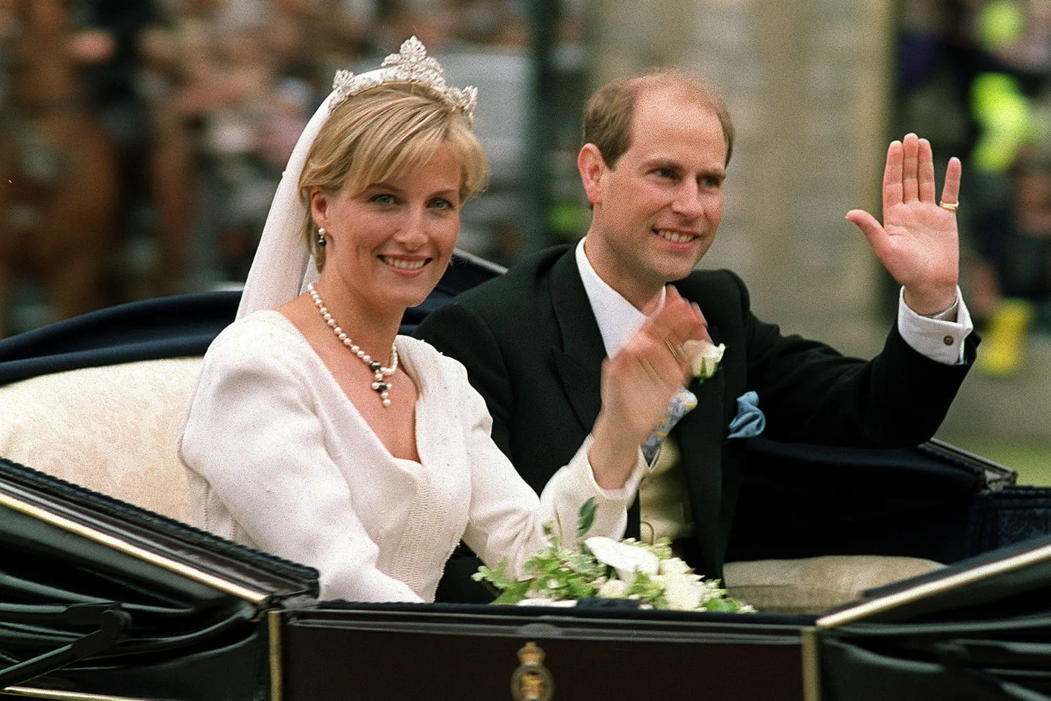 prince edward and sophie countess of wessex wedding day waving to crowd