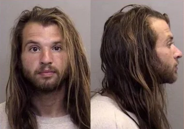 Father charged after tying toddler to a tree like a dog