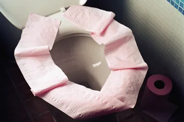 Why you should never put toilet paper on a public toilet seat