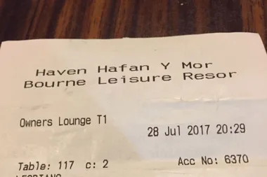 Couple disgusted by what they found written on their bar receipt