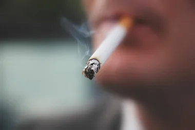 Man with throat cancer shoots friend who got him onto smokes