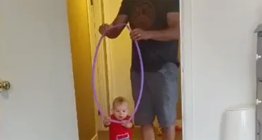 Father teaches 10-month-old baby how to walk with genius trick