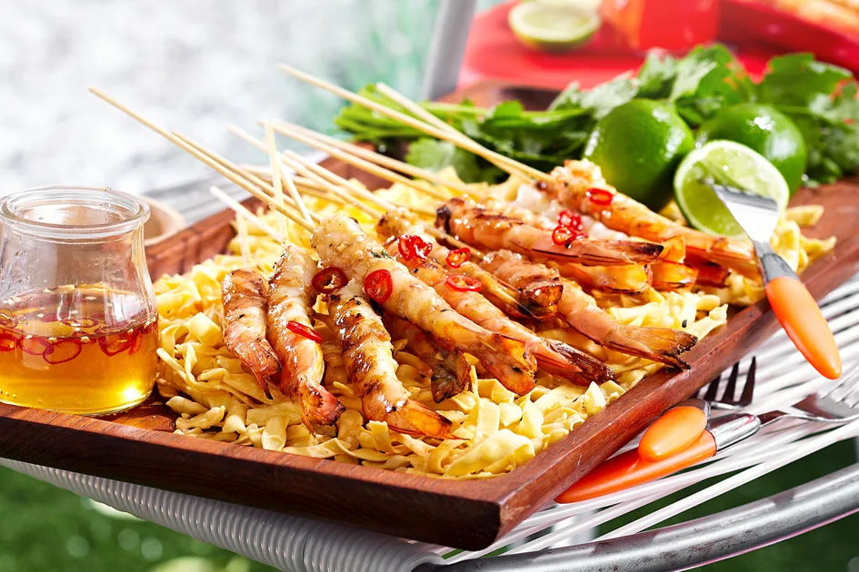 Skewered ginger and garlic prawns with chilli lime syrup Recipe | New Idea