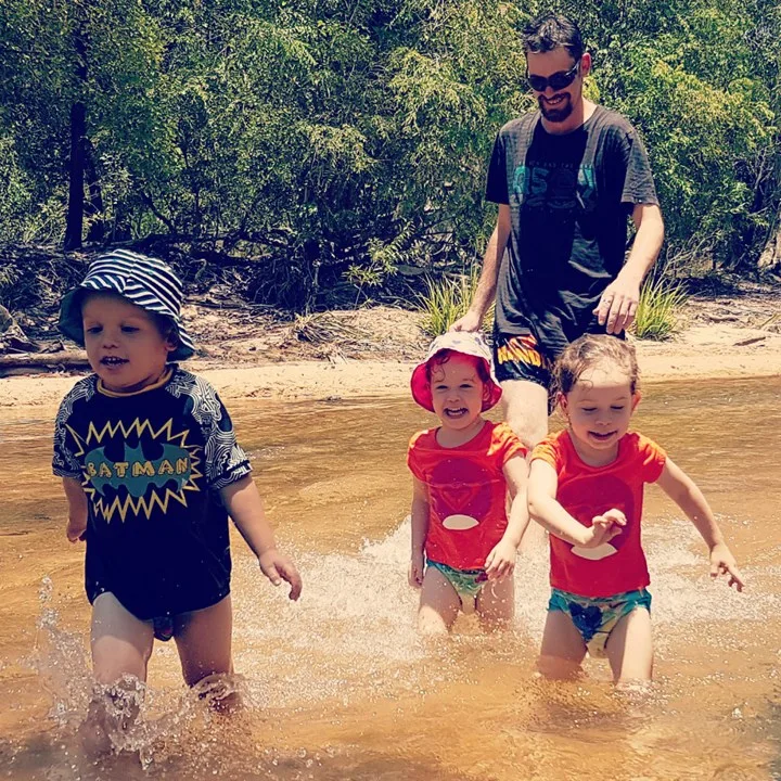 Ash and our children splashing around on our weekend away