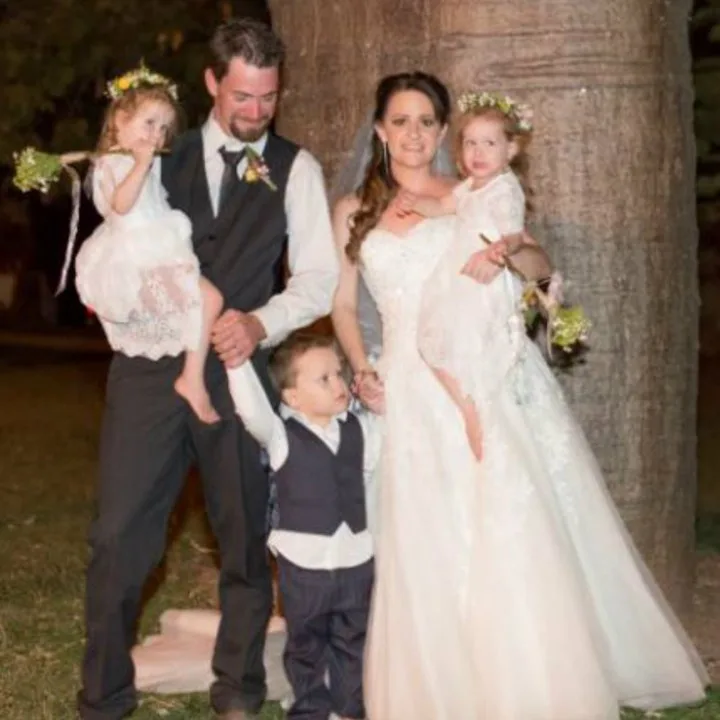 Our wedding, with our three kids beside us, was the happiest day of our lives