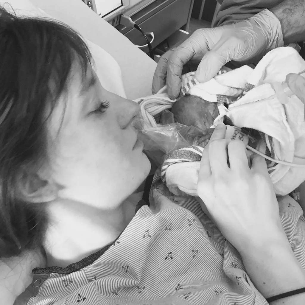 Pictured: Moment 450g baby is held by her mum for the first time