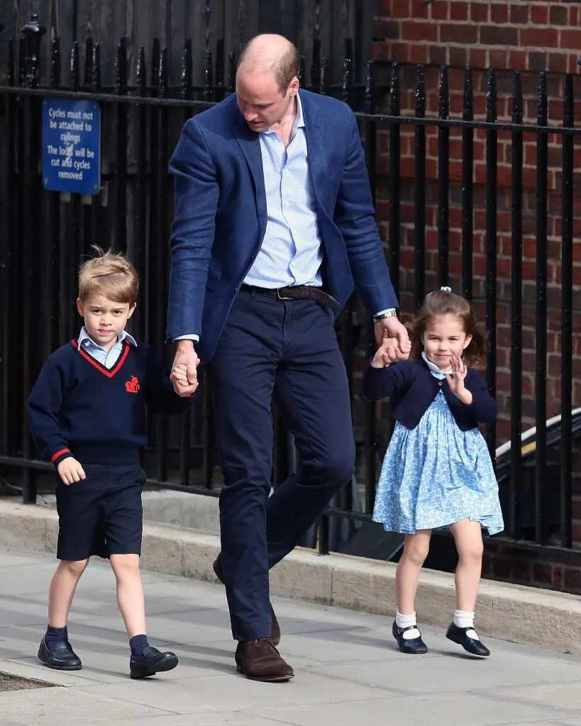 Prince William with George and Charlotte visiting the new royal baby.