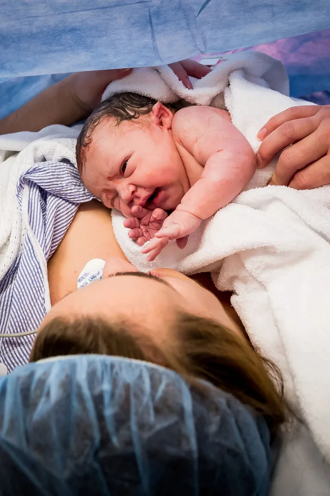 Pictured: The moment C-section baby reaches out to touch her mother’s face