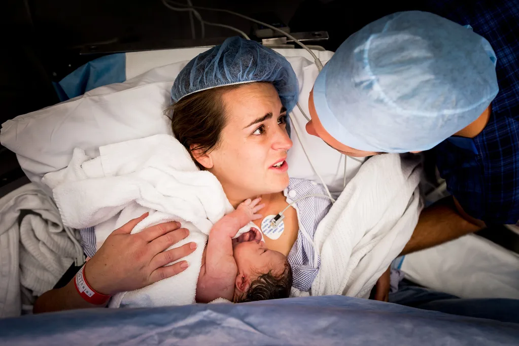 Pictured: The moment C-section baby reaches out to touch her mother’s face