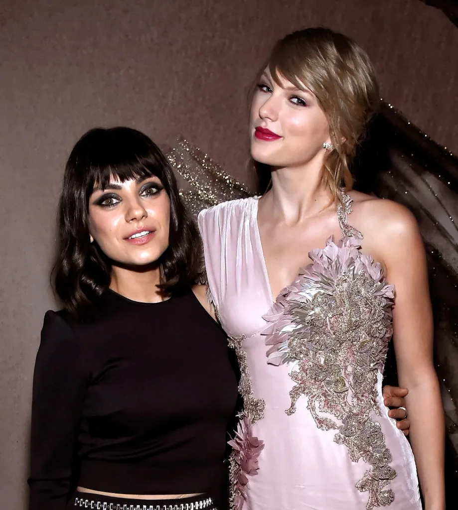 Mila and Taylor Swift backstage at the Billboard Awards