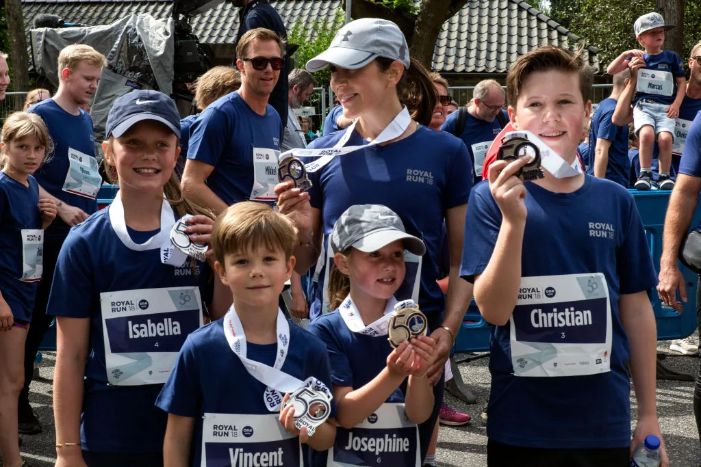 Princess Mary takes part in fun run for her husband's 50th