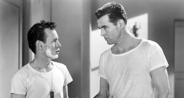 Phipps (left) with Robert Ryan in 1947's 'Crossfire'