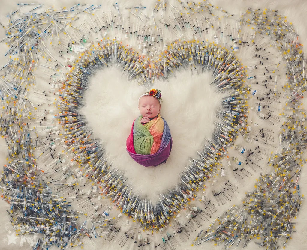 Baby photo showing newborn surrounded by syringes goes viral