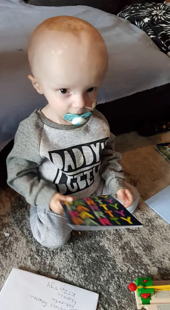 Terminally ill toddler receives 300 birthday cards from strangers during cancer battle