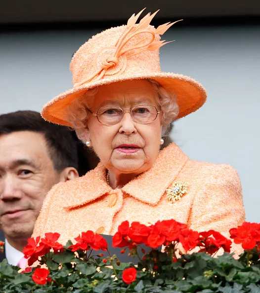 The Queen wears orange to church service