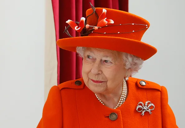 The Queen wears orange to church service