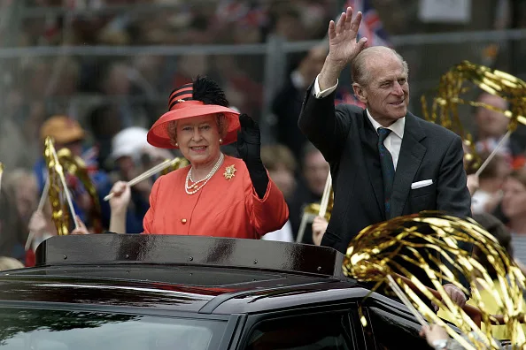 The Queen wears orange to church service