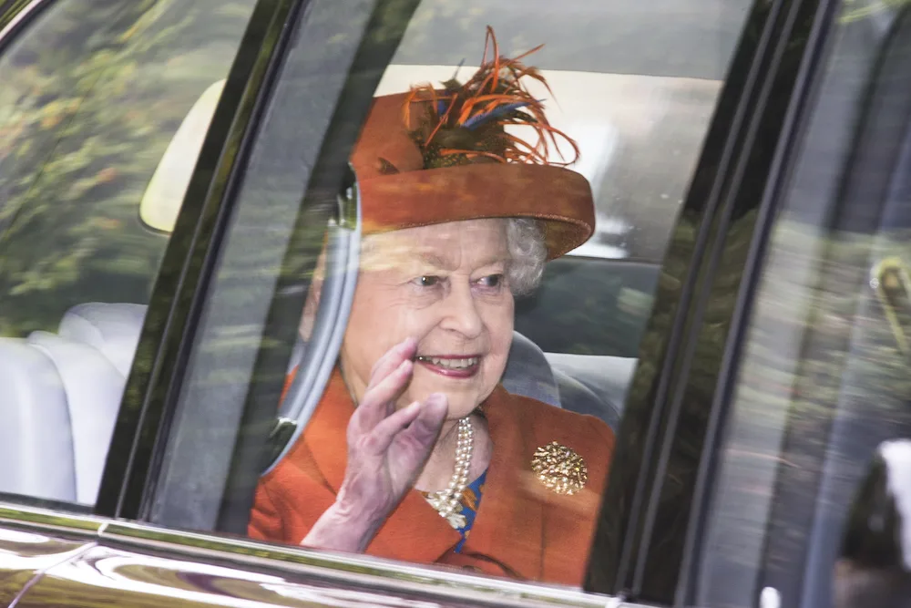 The Queen wears orange to church service