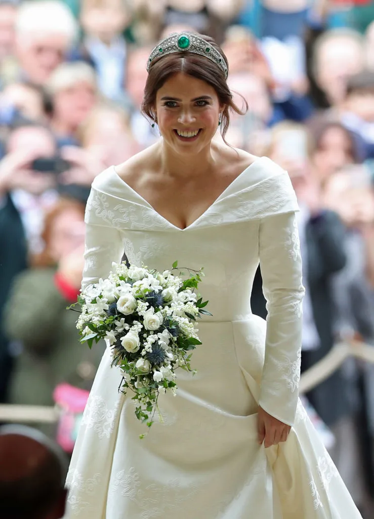 Newlyweds Princess Eugenie and Jack Brooksbank have kissed on the steps of St George’s Chapel after their marriage ceremony