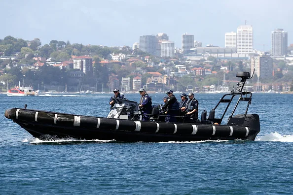 Water police patrol Sydney Harbour during the royal tour