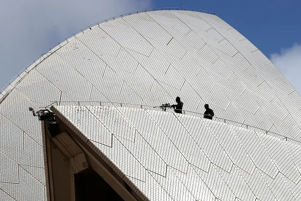 Police snipers on the Opera House during the royal tour