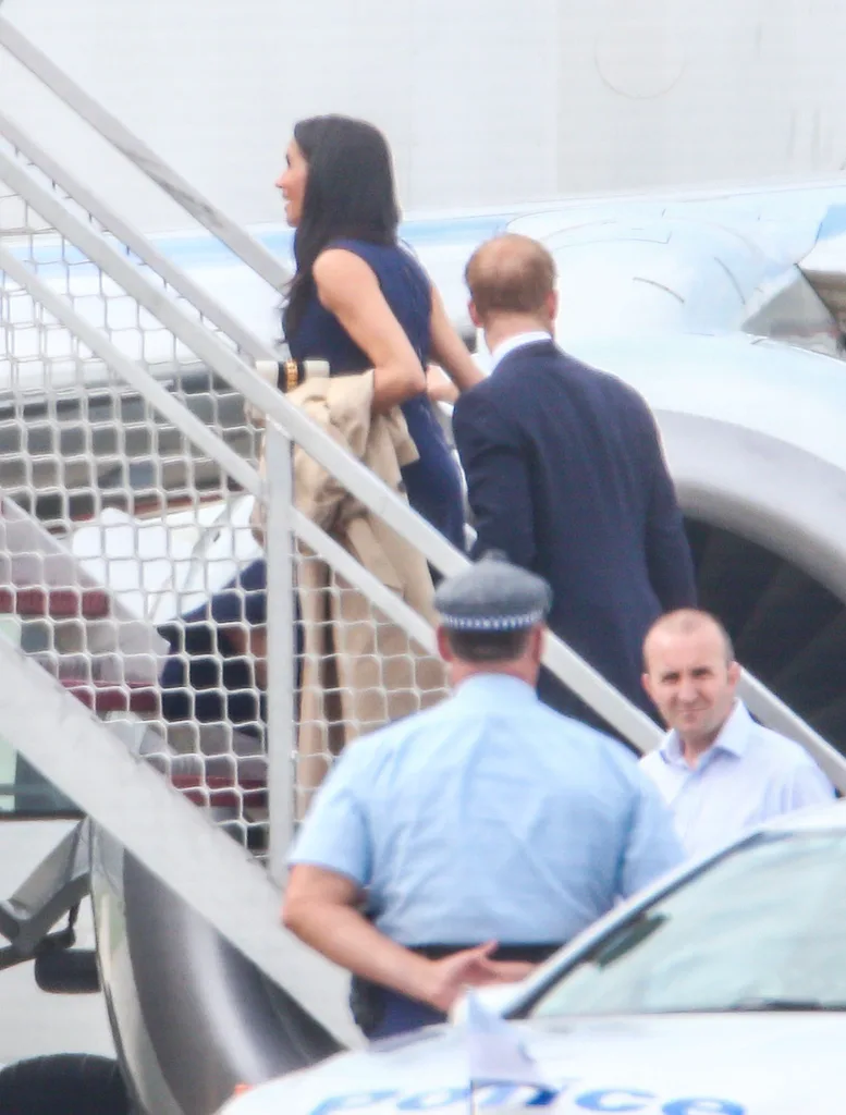 Prince Harry and Meghan Markle board flight to Melbourne