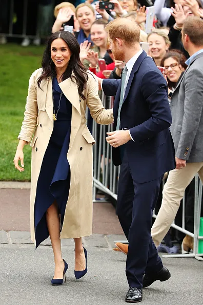 Meghan markle fashion wears blue dion lee dress in Melbourne