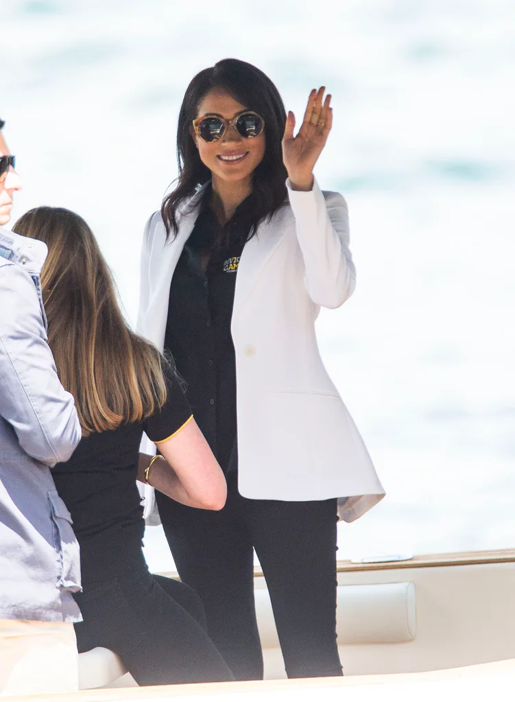 Prince harry takes iphone photos on boat sydney harbour