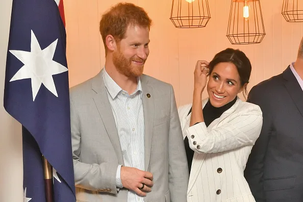 Meghan Markle - now the Duchess of Sussex - was all smiles as she stepped back in front of the cameras after pulling out of a morning event on Oct. 21.