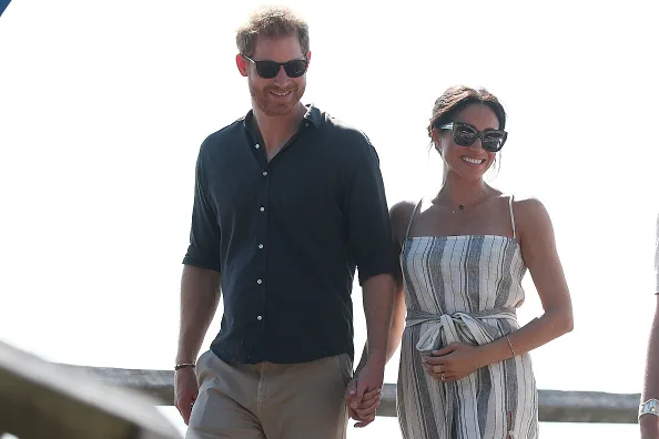 The couple walked along the jetty and were given presents by members of the public. One of them held a sign that said “Rangas Rule”, Australian slang for someone with ginger hair.