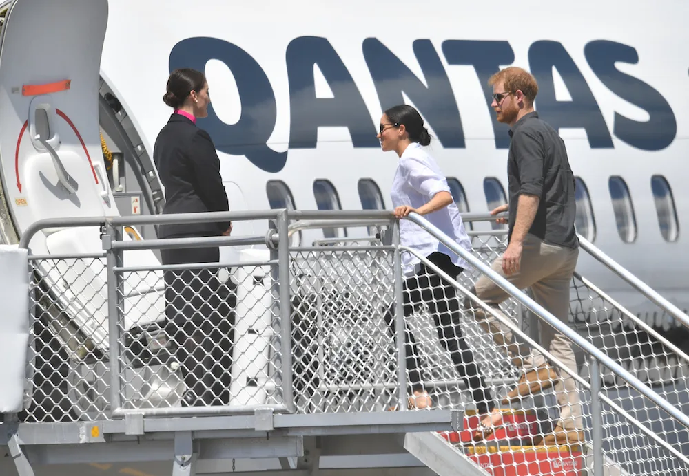 Prince harry Meghan markle board flight fiji
