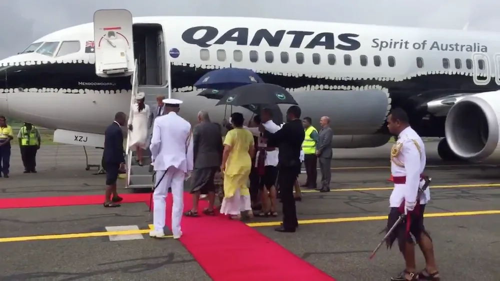 meghan markle wears white arriving fiji