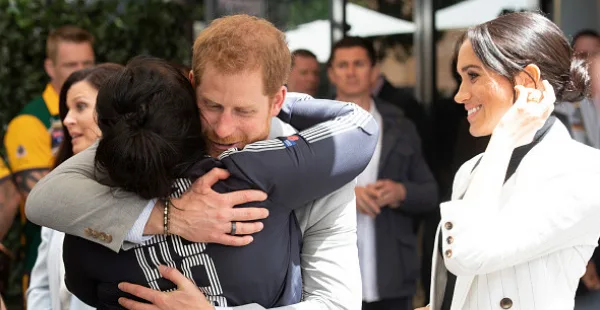 Body language expert on Meghan Markle during Prince Harry hug