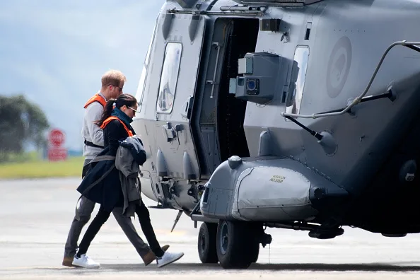 Prince harry Meghan markle board helicopter to abel tasman national park