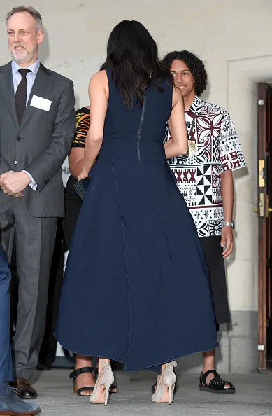 Meghan markle wears blue dress and aquazzura shoes