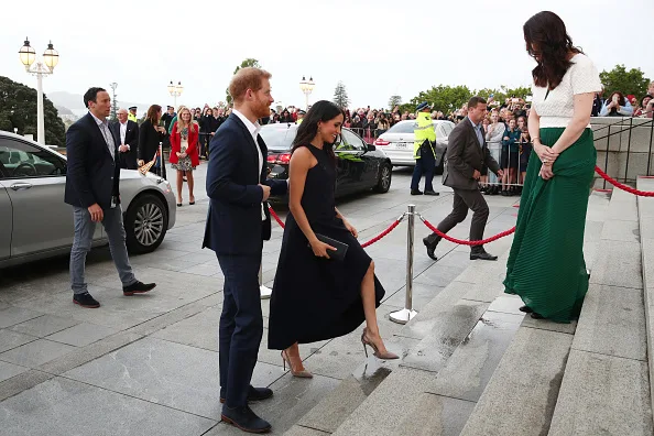 Meghan markle wears blue dress and aquazzura shoes