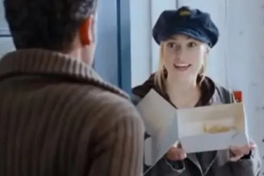 Keira - opening the door to Mark, the man who loves her from afar.